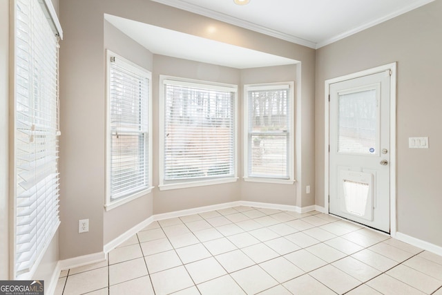 tiled foyer with ornamental molding