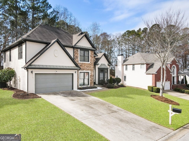 view of front facade with a garage and a front yard