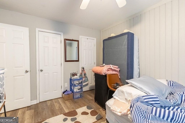 bedroom featuring hardwood / wood-style flooring and ceiling fan