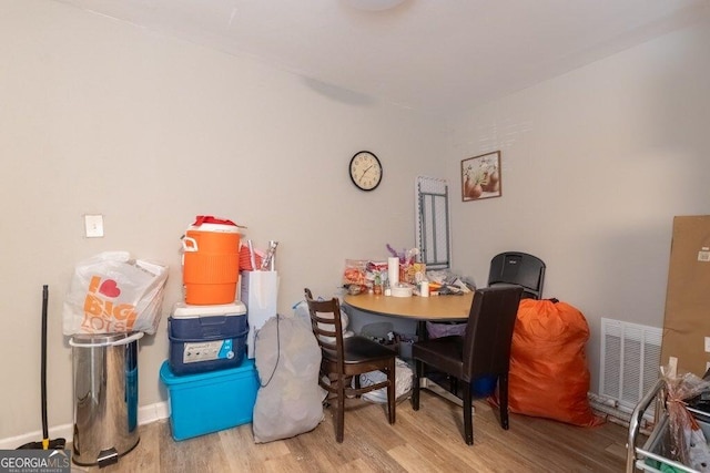 dining room with light wood-type flooring