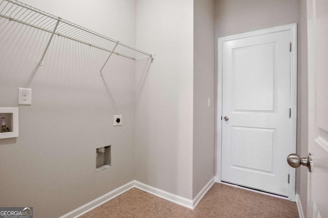 laundry room featuring electric dryer hookup and washer hookup