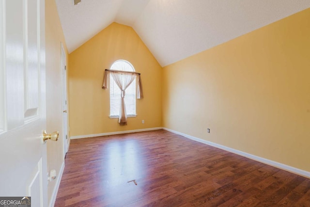 bonus room with lofted ceiling and wood-type flooring