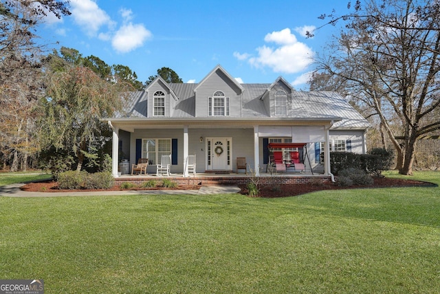 view of front of house with a porch and a front lawn