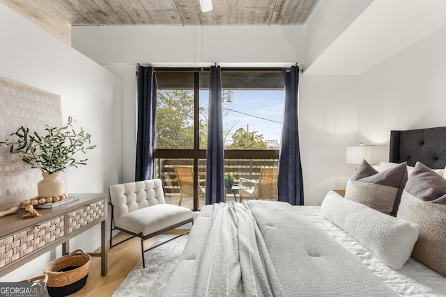 bedroom featuring wood-type flooring