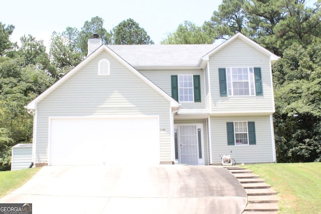 view of front facade with a front lawn, a garage, driveway, and a chimney