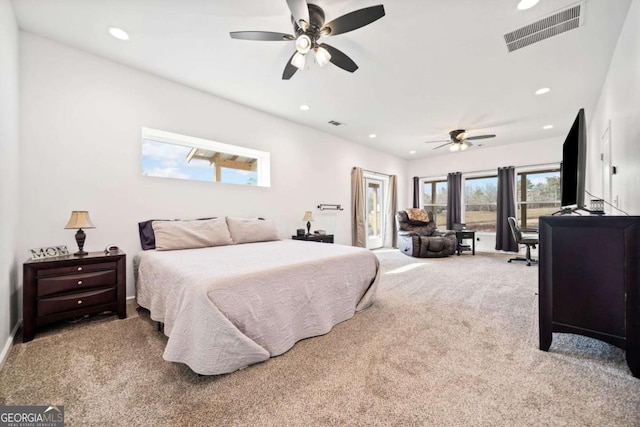 carpeted bedroom with ceiling fan