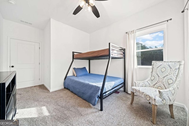 carpeted bedroom with ceiling fan