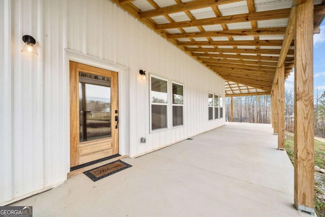 doorway to property with a patio area