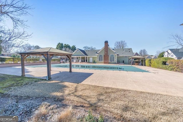 view of pool featuring a gazebo and a patio