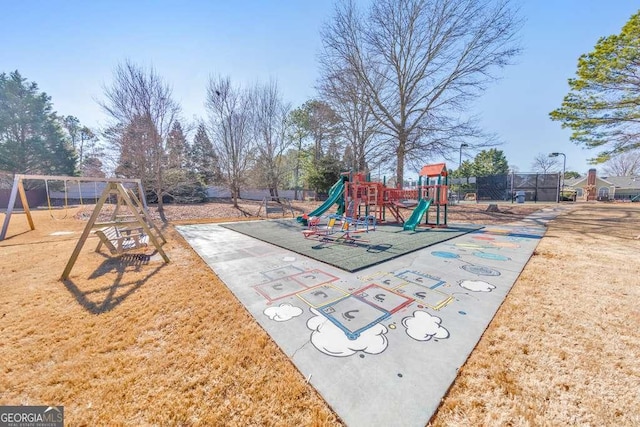 view of play area featuring a lawn