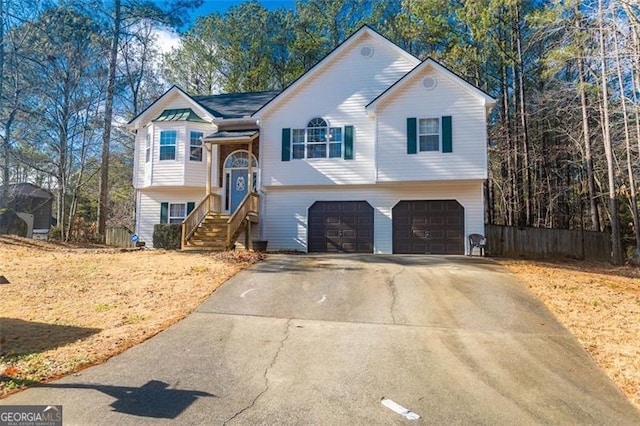 bi-level home featuring a garage