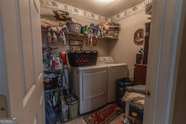 laundry room featuring washing machine and dryer