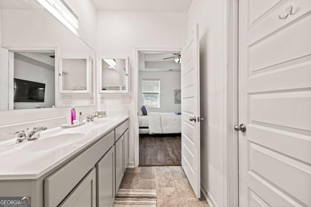 bathroom with vanity and ceiling fan