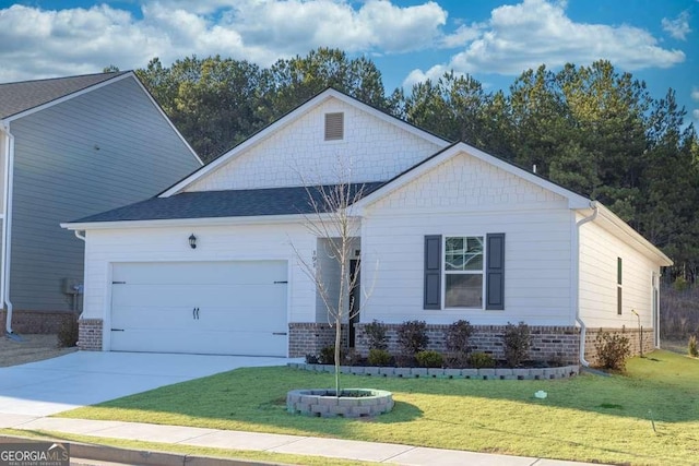 view of front of house with a garage and a front yard