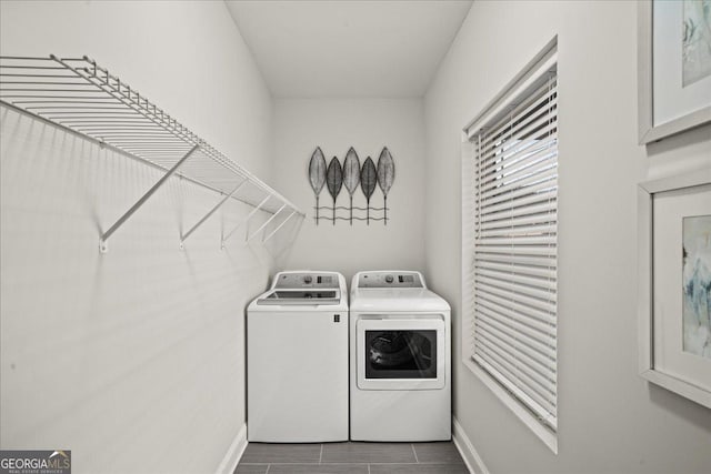 laundry area with washing machine and dryer