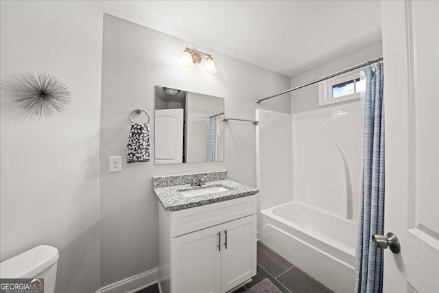 full bathroom featuring vanity, toilet, and shower / bath combo with shower curtain