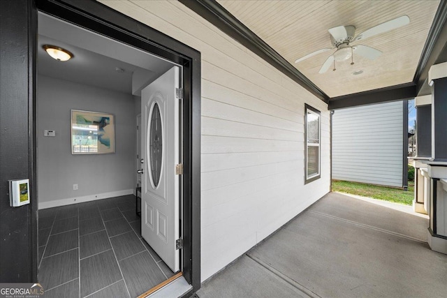 interior space featuring ceiling fan