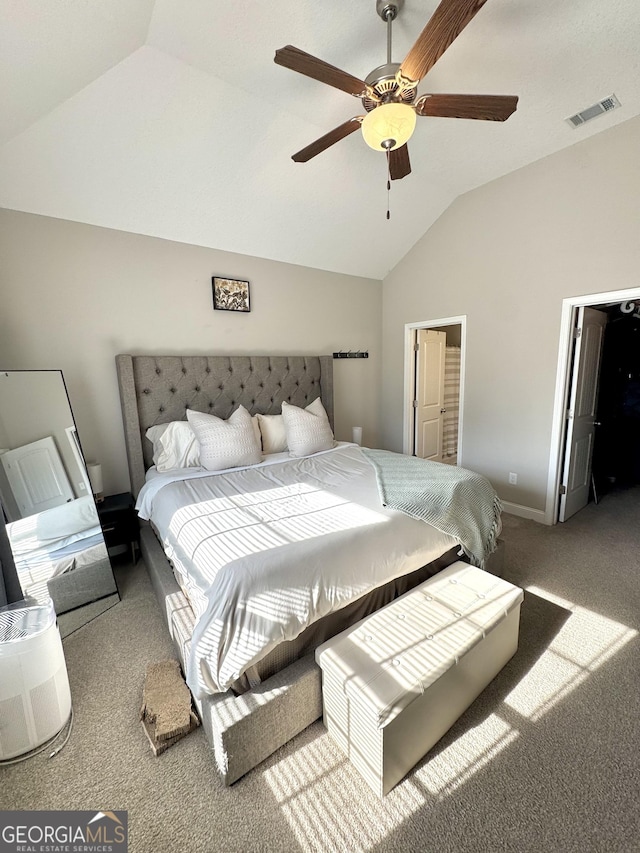 carpeted bedroom with lofted ceiling and ceiling fan