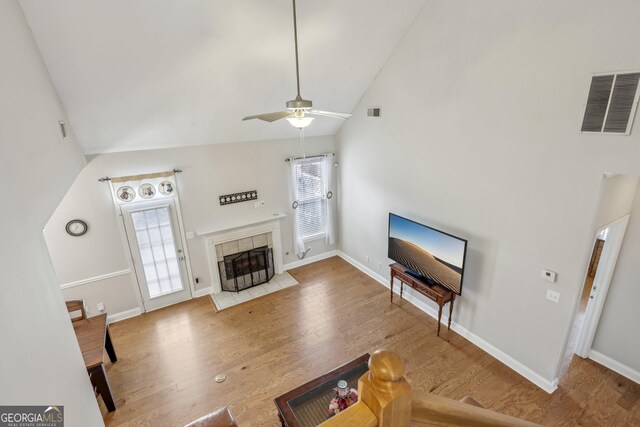 unfurnished living room featuring a fireplace and light wood-type flooring