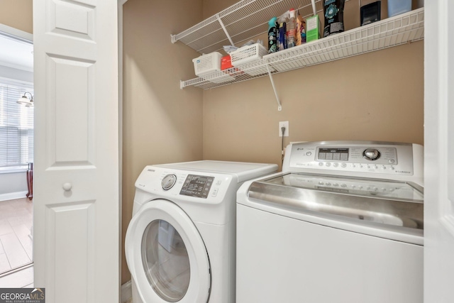 laundry area with washer and dryer