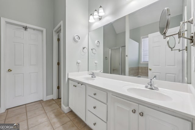 bathroom featuring vanity, separate shower and tub, and tile patterned flooring