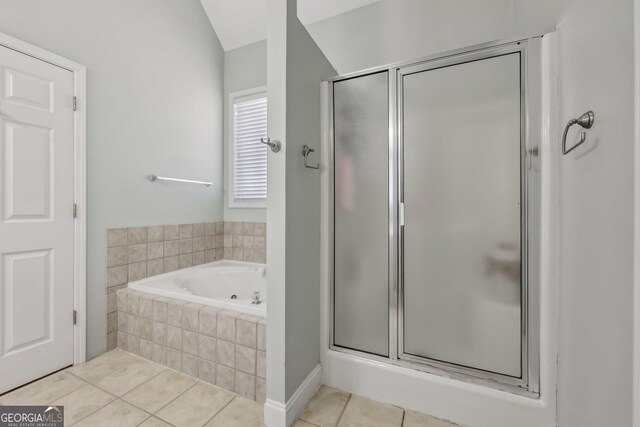 bathroom with tile patterned flooring, vanity, and shower with separate bathtub