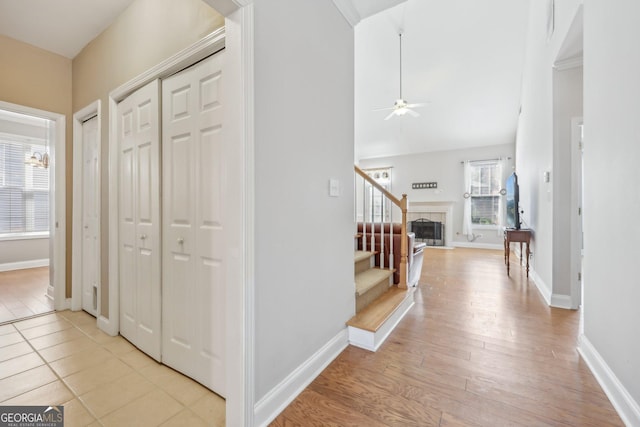 hall with light hardwood / wood-style floors