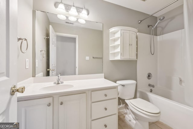 full bathroom with vanity, washtub / shower combination, and toilet