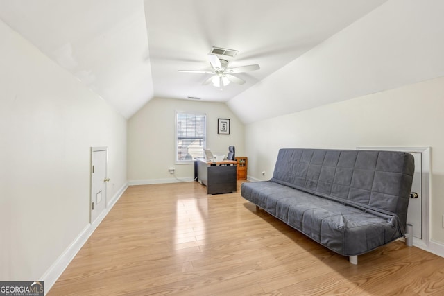 sitting room featuring vaulted ceiling, ceiling fan, and light hardwood / wood-style flooring