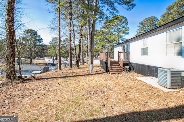 view of yard featuring cooling unit