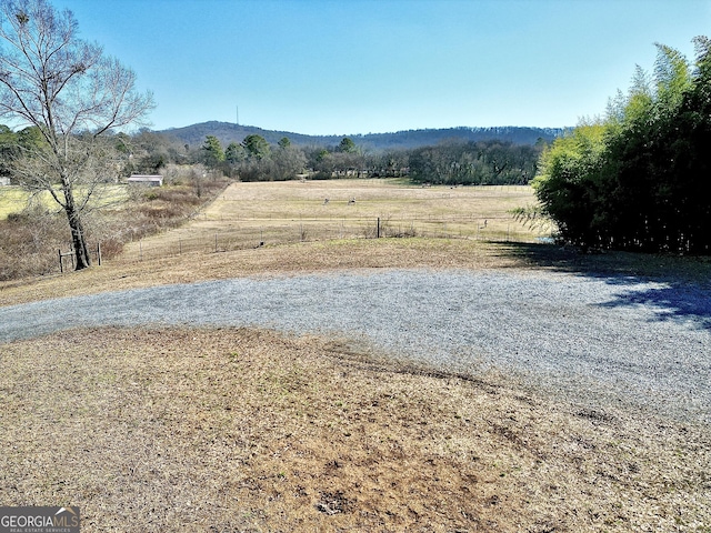 exterior space featuring a mountain view and a rural view