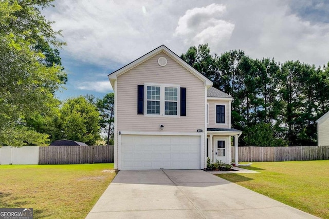 view of front of house with a garage and a front yard