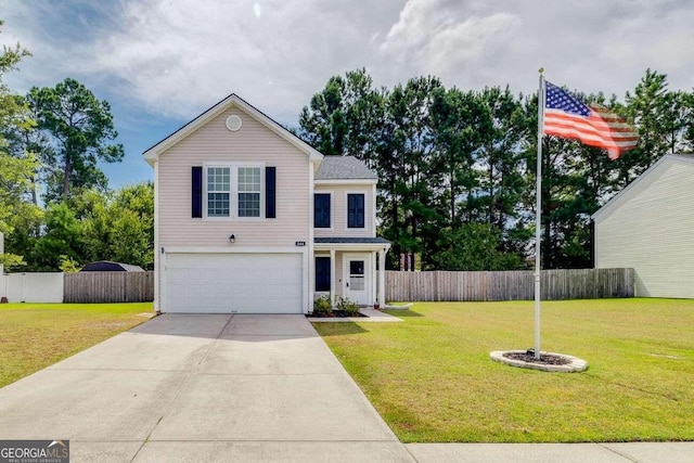 view of front of home featuring a garage and a front lawn