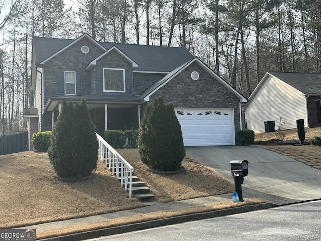 view of front of house with driveway, stone siding, stairway, an attached garage, and a porch