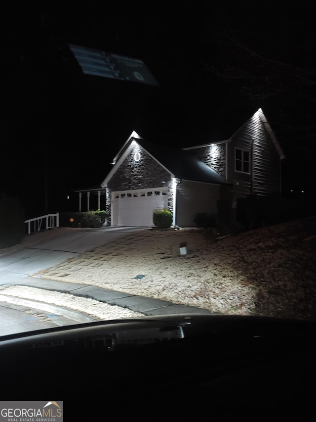 view of front of home with a garage