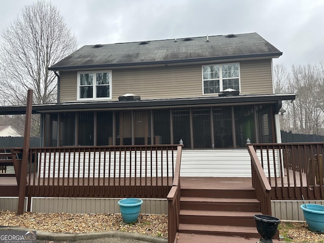1440 Steam Engine Way NE, Conyers, GA 30013 - rear view of house with a sunroom and a deck