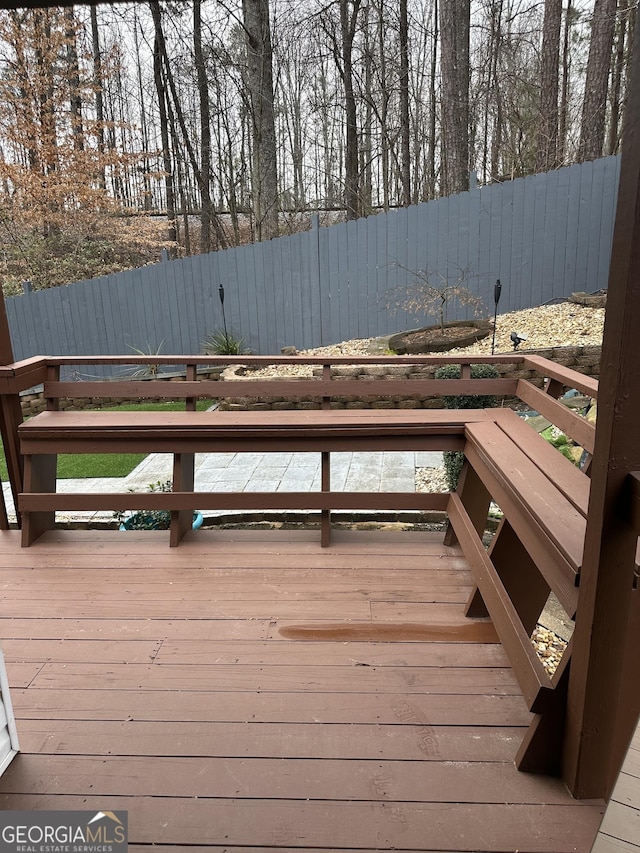 wooden terrace with fence