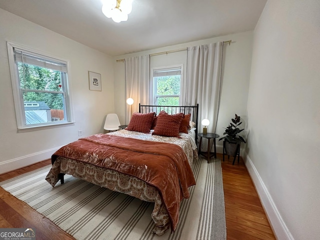 bedroom featuring wood-type flooring