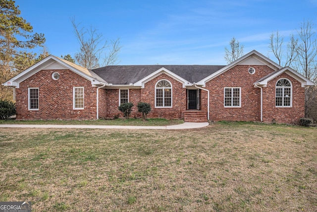 ranch-style house with a front lawn