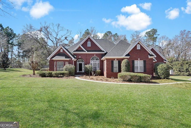 view of front of property with a front lawn