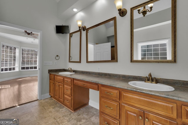 bathroom featuring vanity and ceiling fan