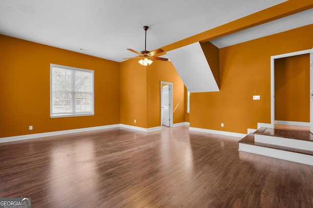 unfurnished living room with hardwood / wood-style floors and ceiling fan