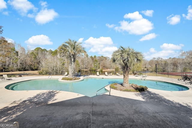 view of pool featuring a patio