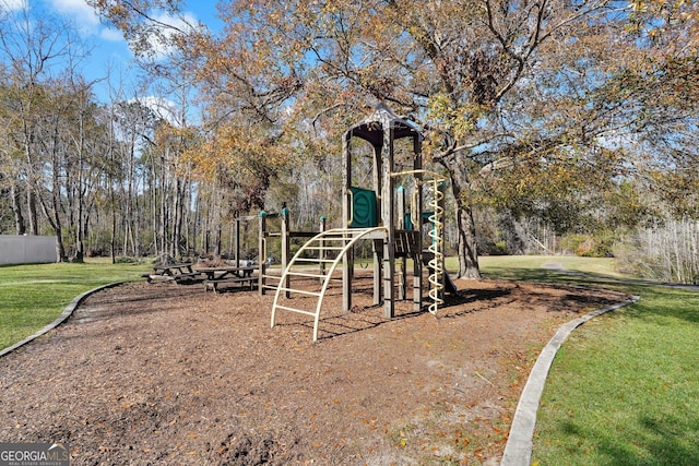 view of playground with a yard