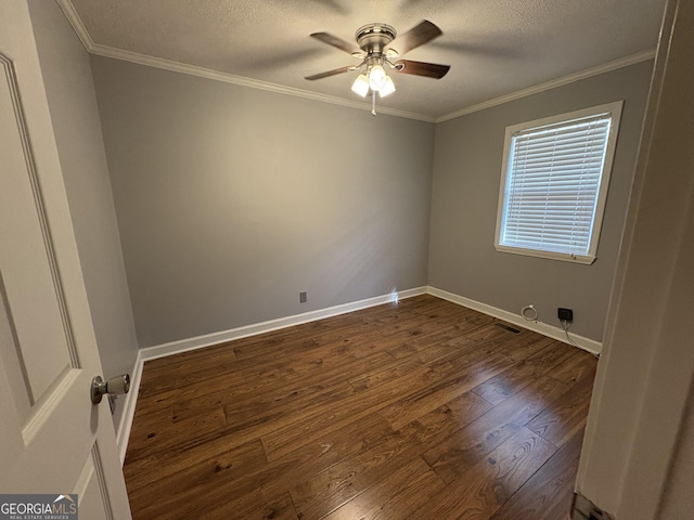 empty room featuring crown molding, a textured ceiling, ceiling fan, and dark hardwood / wood-style flooring