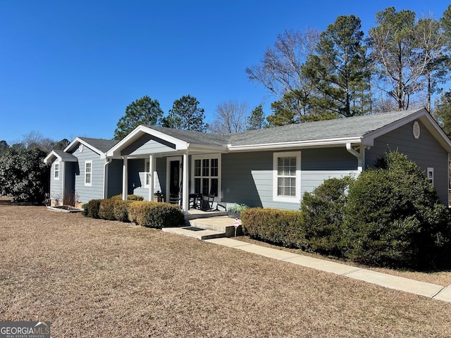 ranch-style home with a porch