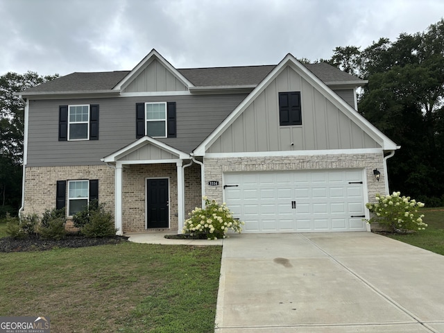 view of front of house with a garage and a front yard