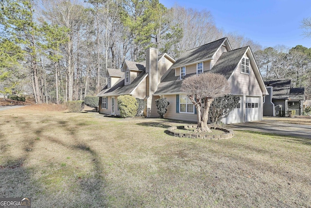 view of property exterior featuring a garage and a yard