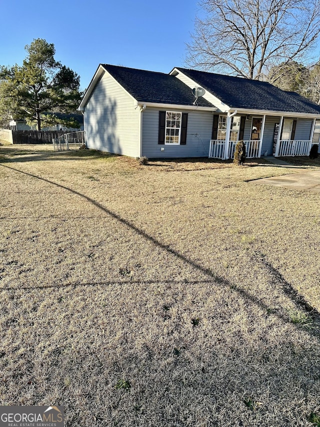 ranch-style home featuring covered porch