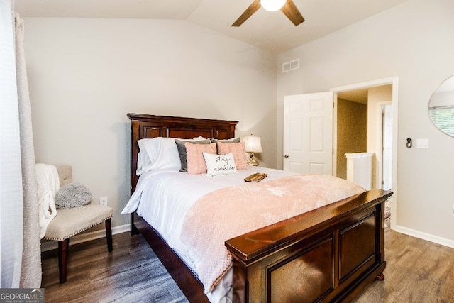 bedroom with ceiling fan, lofted ceiling, and dark hardwood / wood-style flooring